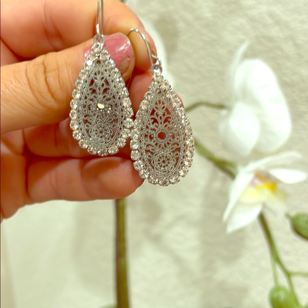 Silver teardrop earrings with diamond ring